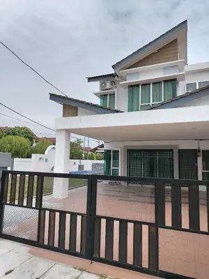 a house with a black fence in front of it at Zehra Villa Seri Iskandar with Private Pool in Seri Iskandar