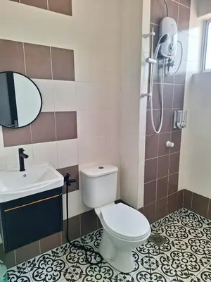 a bathroom with a toilet and a sink and a shower at Zehra Villa Seri Iskandar with Private Pool in Seri Iskandar