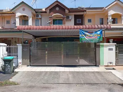 a house with a fence with a sign on it at HD Jaya Shine Homestay in Sungai Petani
