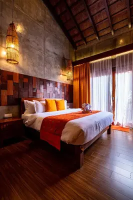 a bedroom with a large bed in a room at Ipoh Bali Hotel in Ipoh