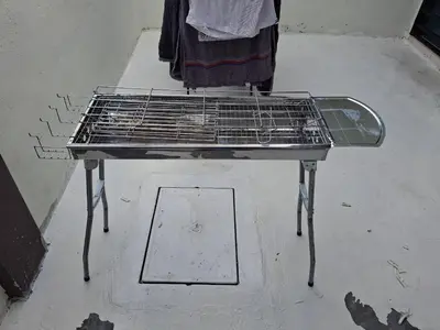 a bird cage sitting on top of a floor at 1132 D' KHASIEH Homestay in Kampong Sungai Wangi Dalam