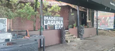 a sign on the side of a building at Sky beach resort in Tanjung Bungah
