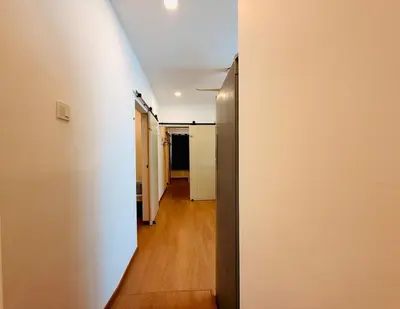 an open hallway with a door to a room at WhiteZen Family Homestay 9Room for 20pax Central Penang in Jelutong