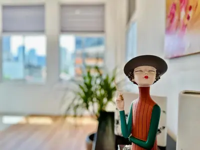 a lego figurine of a woman wearing a fedora at C Y C Heritage Hotel in George Town