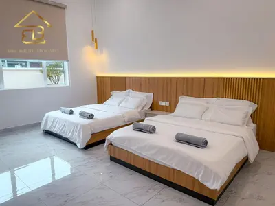 two beds in a hotel room with two at Aesthetic Muji Pool Villa in Ipoh 5BR 24Pax Karaoke Snooker Air hockey in Tambun