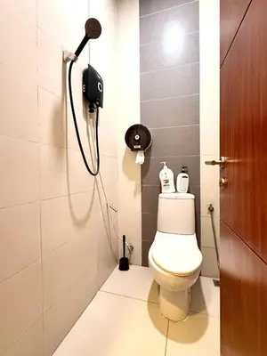 a bathroom with a toilet and a shower at myRoom at 11, Jalan Adams Georgetown in George Town