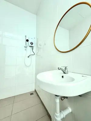 a white bathroom with a sink and a mirror at myRoom at 11, Jalan Adams Georgetown in George Town
