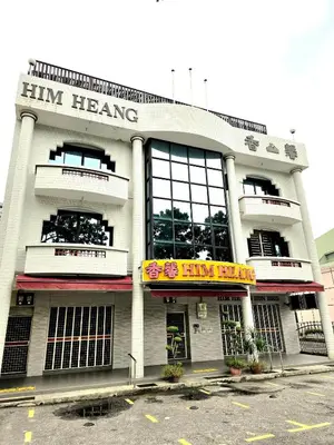 a building with a sign on the front of it at Burma Home at Jalan Burma Georgetown Penang in George Town