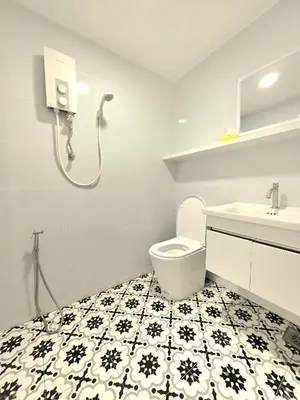 a bathroom with a toilet and a sink at Burma Home at Jalan Burma Georgetown Penang in George Town