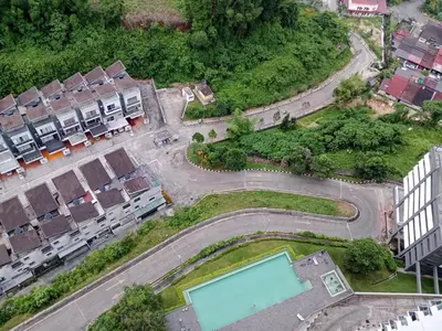 an aerial view of a parking lot with a pool at Skyline Nest Crystal Creek in Taiping