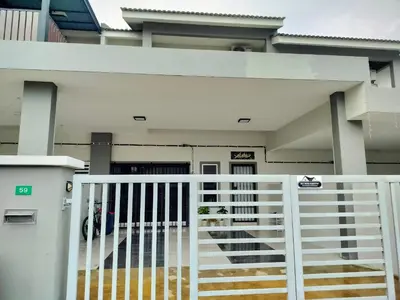 a front view of a house with a white gate at Dee Intan Homestay, Ipoh - Malay Only in Ipoh