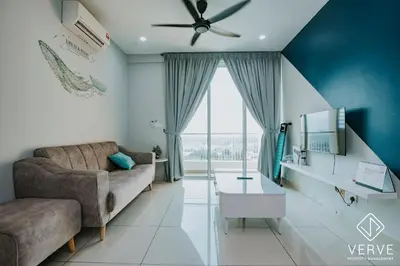 a living room with a couch and a tv at Ipoh D Festivo 2B2B Suite by Verve EECH189 in Ipoh