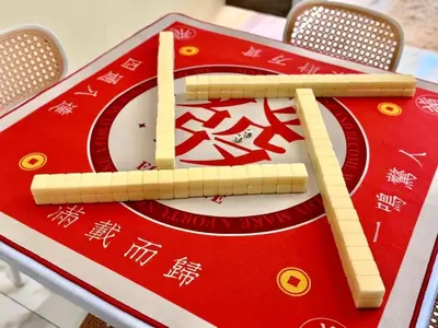 a table with chinese writing on top of it at Warm & Cozy Home in Kampong Duson Gilap