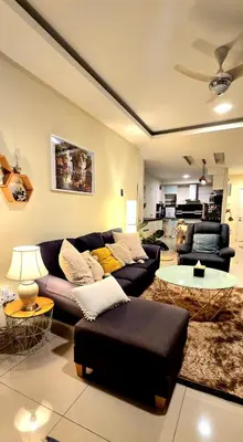 a living room with a couch and a table at #MyHighlandGetaway at OmniCassia Cameron Highlands in Cameron Highlands