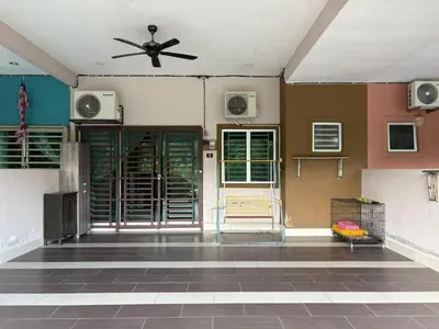 a room with a ceiling fan and a door at Homestay Sakinah No 39 in Tanjung Malim