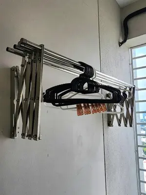 a bunch of cords hanging from the ceiling of a room at Stylish Living 2BR Suite in George Town