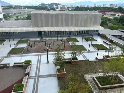 an aerial view of a building with a playground at Little sweet in Gua Sai