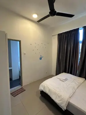 a bedroom with a bed and a ceiling fan at AYAAN Lavender Home at Golden Hills near Night Market in Brinchang