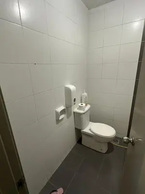 a bathroom with a white toilet in a stall at AYAAN Lavender Home at Golden Hills near Night Market in Brinchang