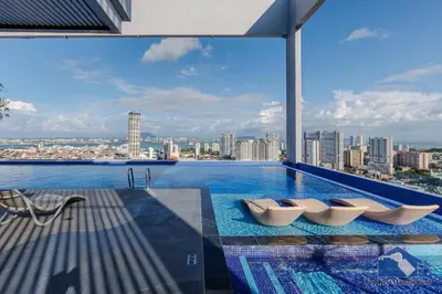 a swimming pool with a view of a city at 22 Macalisterz in George Town