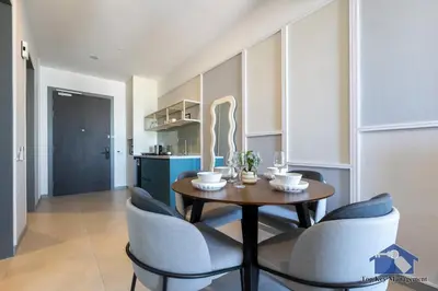 a dining room with a table and chairs at 22 Macalisterz in George Town