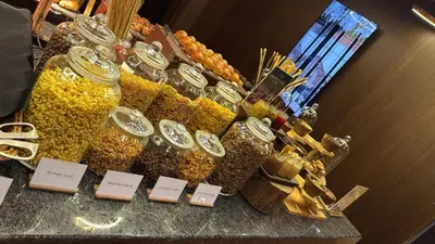 a bunch of jars of food on a table at 1969 D'Kelly Hotel in Ipoh