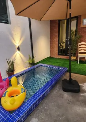 a swimming pool with a rubber duck in a house at Sun Rimba Home by Ipoh Maju Stay in Ipoh