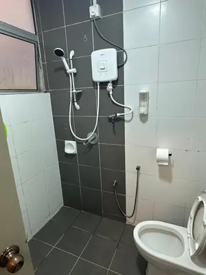 a bathroom with a shower and a toilet at AYAAN MARIGOLD at Golden Hills Night Market View in Brinchang