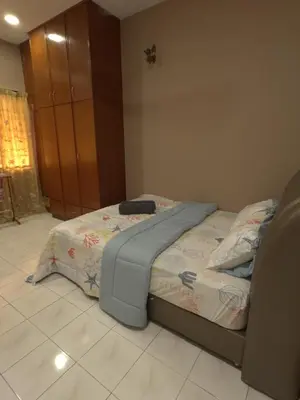 a bedroom with a bed in a room at MM HomeStay 82 in Kamunting