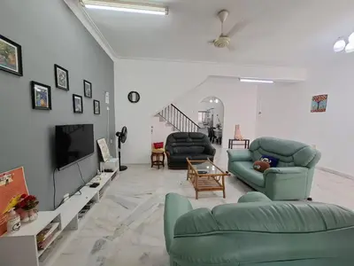 a living room with two couches and a tv at ACACIA GUESTHOUSE by Zamanja in Ipoh