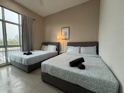 a bedroom with two beds and a window at JS Comfortable Stay Golden Hills Pasar Malam Studio in Brinchang