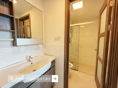 a bathroom with a sink and a shower at StarviewBay Forest City 2B1R Cozy Condo in Gua Sai
