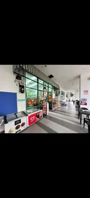 a grocery store aisle with a grocery store at Cybersquare Vertex Tower in Gua Sai