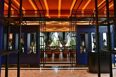 a view of a dining room with a bar at Bertam Wellness Spa & Villas - A Member of Small Luxury Hotels of the World in Kepala Batas