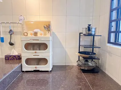 a kitchen with a microwave oven sitting on a counter at BM Alma AutoCity Aeonjusco in Bukit Mertajam