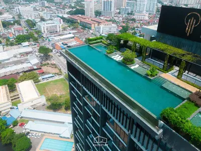 an aerial view of a building with a swimming pool at Beacon #2BR FamilyStay #22Georgetown in George Town