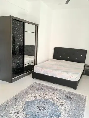 a bedroom with a bed and a large window at Homestay Taman Scientex Kota Tinggi in Gua Sai