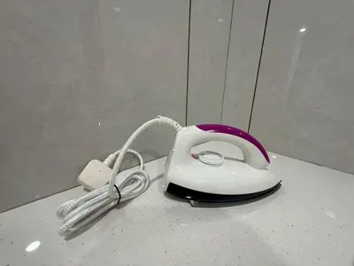a corded phone sitting on top of a counter at Happy Guest House Taman Cowin Nibong Tebal \u5f00\u5fc3\u6c11\u5bbfTaman Cowin\u9ad8\u6e0a\u533a in Nibung Tebal