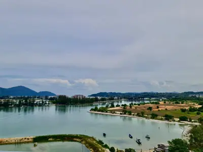 a view of a river with boats on it at Marina Teluk Batik by Manhattan Group in Lumut