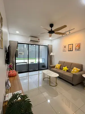 a living room with a couch and a ceiling fan at Manhattan Condominium Ipoh' Rachel in Ipoh