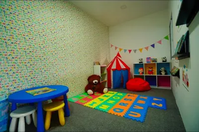 a childs room with a table and a toy tent at Manhattan Condominium Ipoh' Rachel in Ipoh