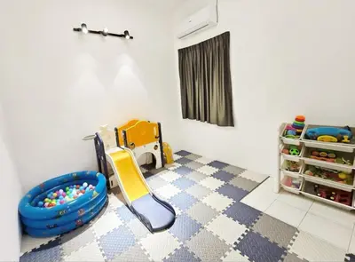 a childs room with a playroom with a play equipment at Blue House Kampar 3BR Family Suite-Kids Playroom Near UTAR in Kampar