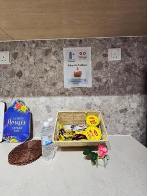 a tray of food sitting on top of a counter at Blue House Kampar 3BR Family Suite-Kids Playroom Near UTAR in Kampar