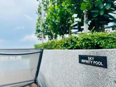 a sign that says say symmetry pool on a wall at Premium Comfort Rooftop View bayan lepas airport 9pax in Bayan Lepas