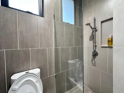 a bathroom with a toilet and a shower at Premium Comfort Rooftop View bayan lepas airport 9pax in Bayan Lepas