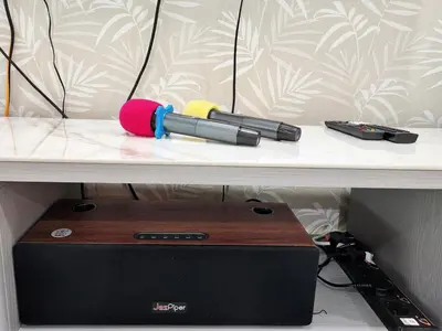 a desk with a router and a box on it at 2Op Ipoh, Semi D, in Ipoh