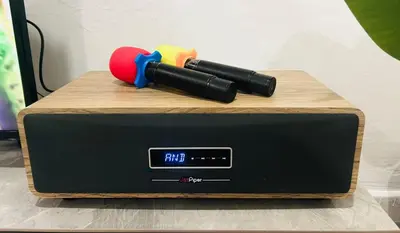 a black router with a red ball on top of it at Ipoh Lazy Private Club House 4B3B by Verve 14 pax in Tambun