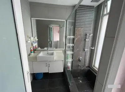 a bathroom with a sink and a shower at Neamat