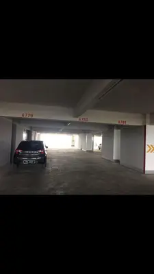 a car parked in an empty parking lot at The Venus Sweet home in Sitiawan