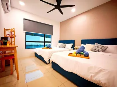 a bedroom with two beds and a window at Ipoh Manhattan Free Waterpark 3BR 8Pax Family Suite MHA306 by City Home Empire in Ipoh